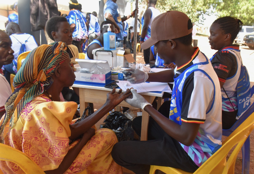 Community members receiving health services during the Rotary Cancer Run activities
